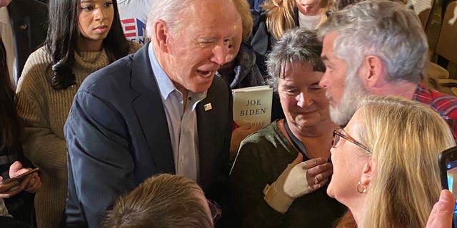 Democratic presidential candidate Joe Biden speaks with voters at campaign event in Claremont, NH on Jan. 24, 2020