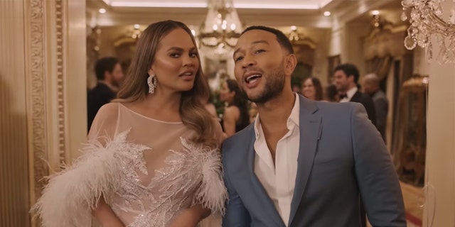 Chrissy Teigen (L) apologized for trolling people on the Internet in the past. 