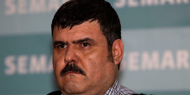 Jorge Eduardo Costilla Sanchez, aka "El Coss," is shown during a media presentation at the Mexican Navy's Center for Advanced Naval Studies in Mexico City.