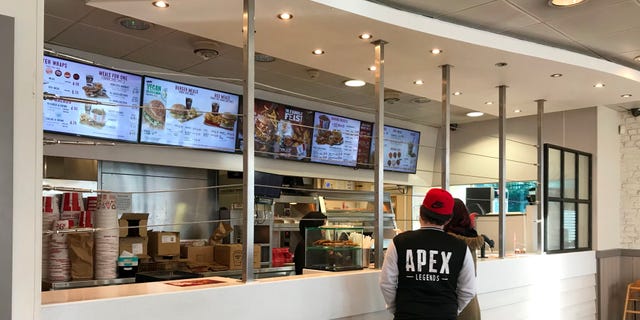 After a spate of violent incidents, the restaurant installed security wiring secured to metal bars that extend from the counter to the ceiling.