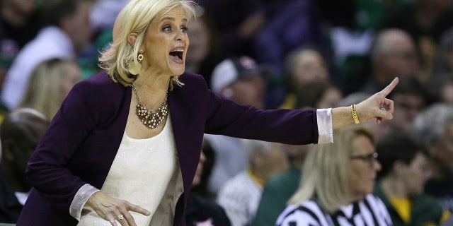 Baylor head coach Kim Mulkey calls in an offensive play in the second half of an NCAA college basketball game against West Virginia, Saturday, Jan. 18, 2020, in Waco, Texas. (AP Photo/Rod Aydelotte)