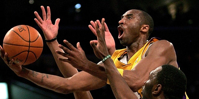 Kobe Bryant of the Lakers faces the Boston Celtics in Los Angeles.  (AP Photo/Branimir Kvartuc, File)