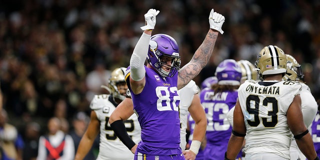 Minnesota Vikings tight end Kyle Rudolph (82) celebrating a touchdown by Dalvin Cook in the second half of the NFL wild-card playoff game against the New Orleans Saints on Sunday. (AP Photo/Brett Duke)