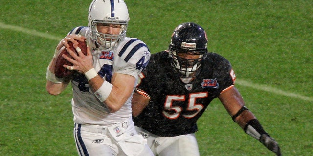Lance Briggs and the Bears' defense had to deal with Peyton Manning. (Photo by Brian Bahr/Getty Images)
