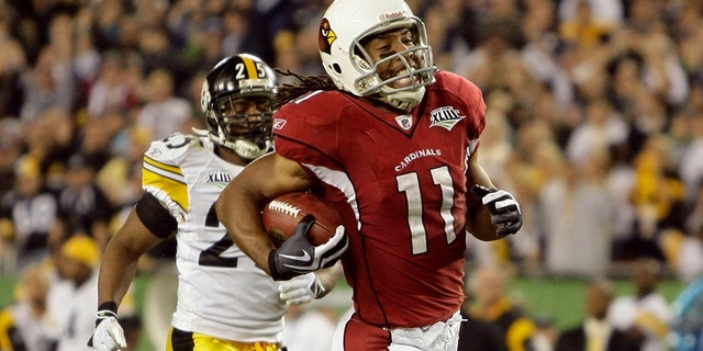Larry Fitzgerald was Kurt Warner's top target in Super Bowl XLIII. (Photo by Mark Cornelison/Lexington Herald-Leader/Tribune News Service via Getty Images)