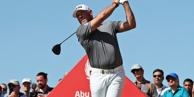 England's Lee Westwood tees off on the 2nd hole during the final round of the Abu Dhabi Championship golf tournament in Abu Dhabi, United Arab Emirates Jan. 19, 2020. 