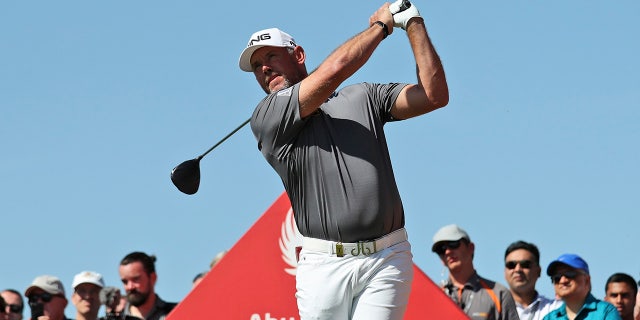 England's Lee Westwood tees off on the 2nd hole during the final round of the Abu Dhabi Championship golf tournament in Abu Dhabi, United Arab Emirates Jan. 19, 2020.