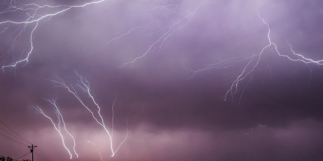 Upward lightning leaps from a communication tower in Bruceville-Eddy, Texas, 27 April 2016 - file photo.