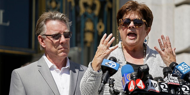 Liz Sullivan, right, and Jim Steinle, left, the parents of Kathryn Steinle, answer questions during a news conference on the steps of City Hall Tuesday, Sept. 1, 2015, in San Francisco. (AP Photo/Eric Risberg)