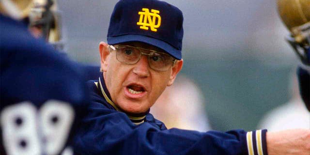 Head Coach Lou Holtz of the Notre Dame Fighting Irish gives instructions to his players during a practice circa 1988 at Notre Dame in South Bend, Indiana. Holtz coached the Notre Dame Fighting Irish from 1986-1996. (Photo by Focus on Sport/Getty Images)<br>