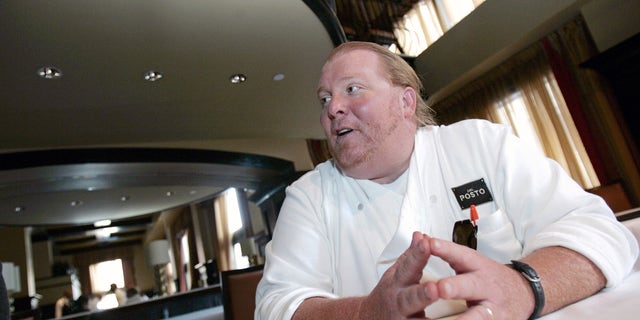 Celebrity chef Mario Batali talks during an interview at his restaurant, Del Posto, in New York April 11, 2006.
