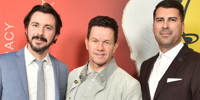 Brian Lazarte, left, Mark Wahlberg, and James Lee Hernandez, right, attend the LA Premiere Of HBO's "McMillion$ at the Landmark Theater on January 30, 2020 in Los Angeles, Calif. (Photo by Gregg DeGuire/FilmMagic)