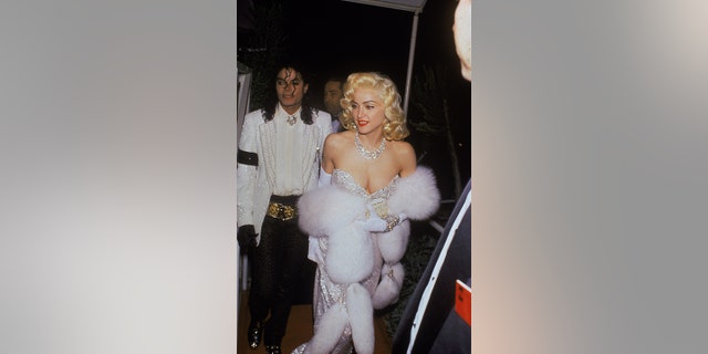 Michael Jackson (left) and Madonna arrive at the Shrine Civic Auditorium for the 63rd Annual Academy Awards ceremony.