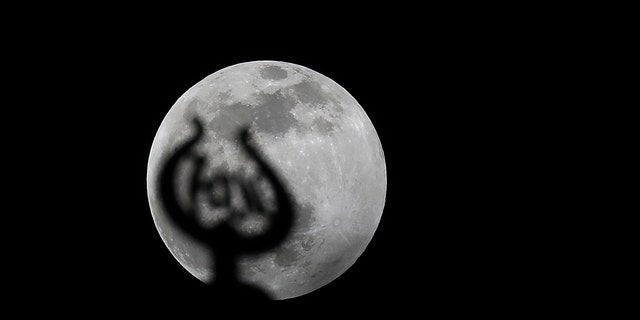 The Moon is seen during partial lunar eclipse over Istanbul, Turkey on January 10, 2020.