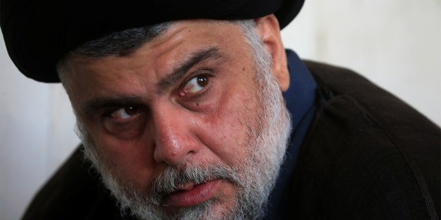 Iraqi Shi'ite cleric Muqtada al-Sadr attends Friday prayer at the Kufa mosque in Najaf, Iraq November. (REUTERS/Alaa al-Marjani)