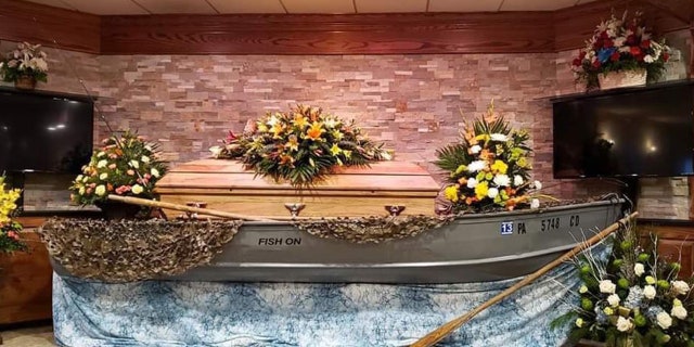 Frey’s casket was placed inside Frey’s own 16-foot aluminum fishing boat, which had been passed down from his grandfather and father, for the viewing.