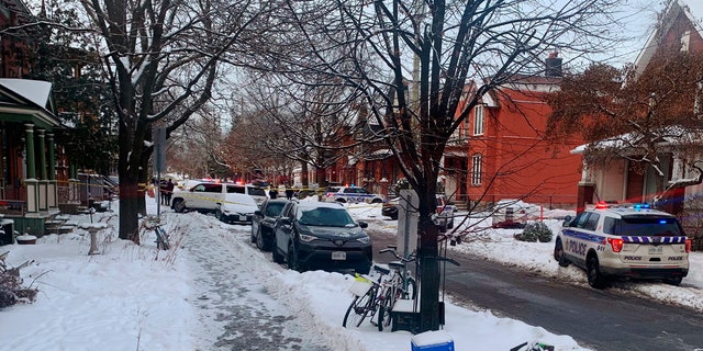 Police inspect the scene of a shooting in downtown Ottawa on Wednesday, Jan. 8, 2020.