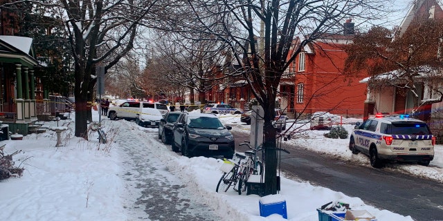 Police inspect the scene of a shooting in downtown Ottawa on Wednesday, Jan. 8, 2020.