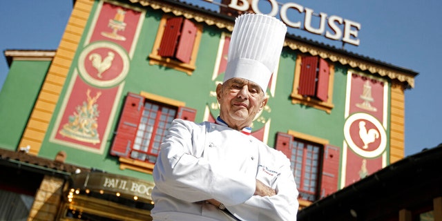 French chef Paul Bocuse, seen here in 2011, poses outside his famed Michelin L'Auberge du Pont de Collonges.