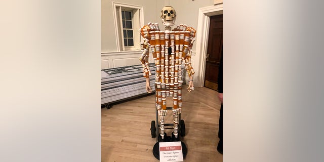 "Pill Man" is composed of hundreds of pill bottles Huntley amassed during his 15 years on prescription drugs, he said.