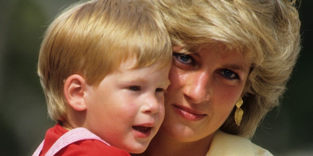 Diana, Princess of Wales with Prince Harry on holiday in Majorca, Spain