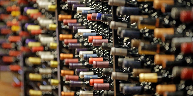 FILE - In this June 16, 2016, file photo, bottles of wine are displayed during a tour of a state liquor store, in Salt Lake City. (AP Photo/Rick Bowmer, File)