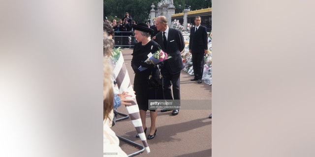 Queen Elizabeth II and Prince Philip, Duke of Edinburgh pictured at the public funeral of Diana, Princess of Wales.