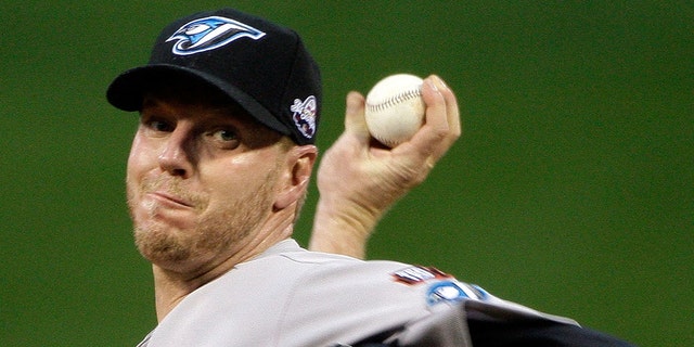 ST LOUIS, MO - JULY 14: American League All-Star Roy Halladay of the Toronto Blue Jays pitches during the 2009 MLB All-Star Game at Busch Stadium on July 14, 2009 in St Louis, Missouri. (Photo by Morry Gash-Pool/Getty Images)