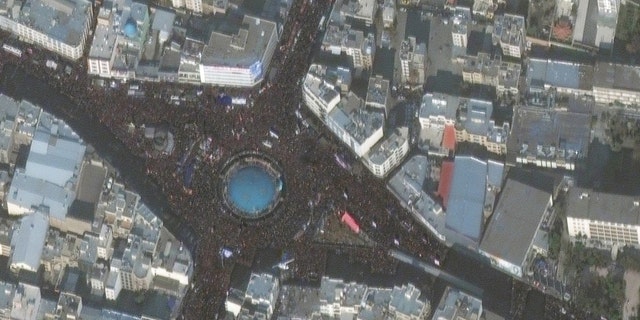 Funeral crowds at Tehran's Enghelab Square.