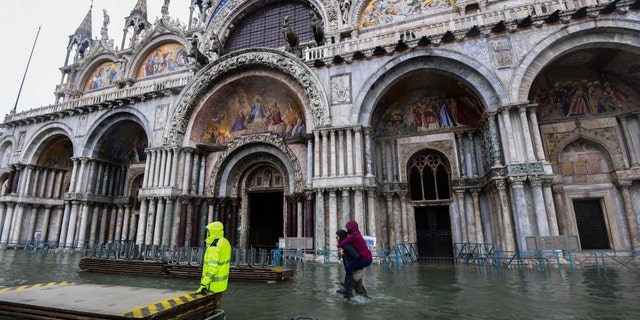 Footbridges were set up for pedestrians in Venice following the record flooding in November.