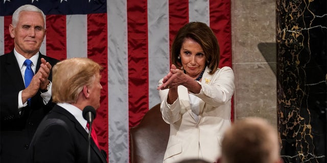 House Speaker Nancy Pelosi applauds President Trump during a State of the Union address to a joint session of Congress at the U.S. Capitol in Washington.(Photographer: Doug Mills/Pool via Bloomberg)