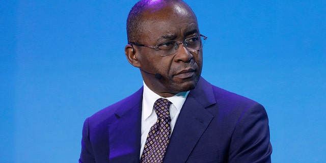 Strive Masiyiwa, founder and chairman of Econet Wireless Global Ltd., attends a panel discussion at the Bloomberg New Economy Forum in Singapore, in 2018. Striking doctors in Zimbabwe accepted his offer to pay them if they go back to work. (Justin Chin/Bloomberg via Getty Images)