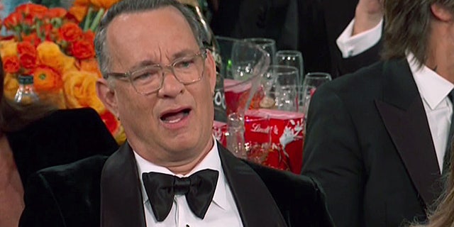 Tom Hanks' face went viral during the Golden Globes on Sunday night.