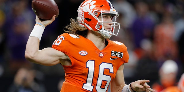 Clemson quarterback Trevor Lawrence passes against LSU during the second half of a NCAA College Football Playoff national championship game Monday, Jan. 13, 2020, in New Orleans. (AP Photo/Gerald Herbert)