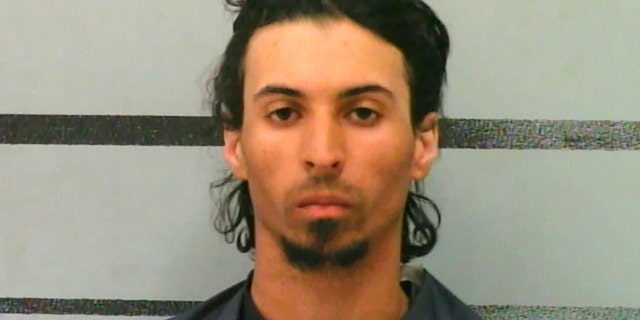 Rowe, accused of stuffing his girlfriend's 10-month-old daughter into a backpack and leaving her in a car trunk for hours, was charged Wednesday with capital murder in her death. (Lubbock County Jail via AP)
