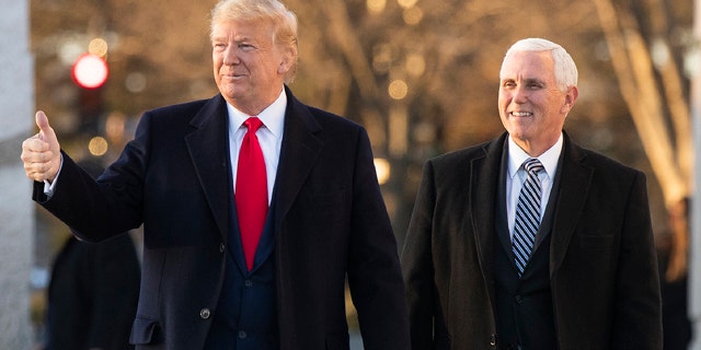 President Donald Trump and Vice President Mike Pence visit the Martin Luther King Jr. Memorial, Monday, Jan. 20, 2020, in Washington. (AP Photo/Manuel Balce Ceneta)