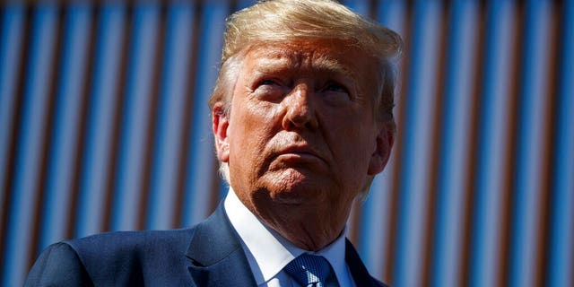 President Donald Trump tours a section of the southern border wall, Wednesday, Sept. 18, 2019, in Otay Mesa, Calif. (AP Photo/Evan Vucci)