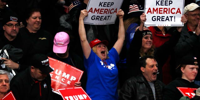 Supporters cheer as President Donald Trump speaks at a campaign rally, Thursday, Jan. 9, 2020, in Toledo, Ohio. (AP Photo/ Jacquelyn Martin)