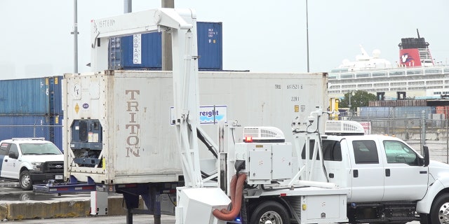 One of the tools federal authorities are using are called VACIS trucks. These trucks X-ray every single item that comes into the stadium. VACIS systems scan cargo containers and any vehicles to help authorities search for nuclear material, weapons, narcotics and goods at all checkpoints.