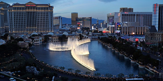 In this file photo from April 4, 2017, the Bellagio fountains erupt along the Las Vegas Strip in Las Vegas.  (AP Photo / John Locher, file)