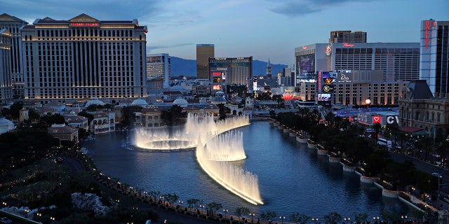 In this April 4, 2017, file photo, the fountains of Bellagio erupt along the Las Vegas Strip in Las Vegas. (AP Photo/John Locher, File)