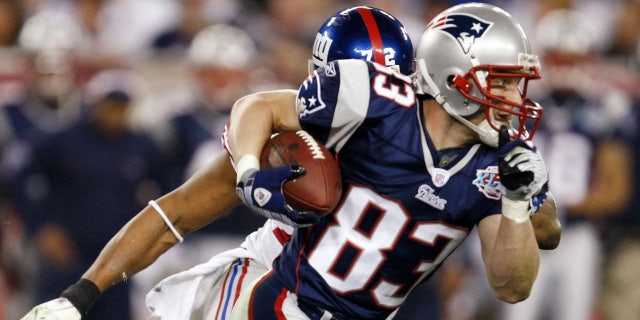 Wes Welker couldn't do enough to help the Patriots beat the Giants. (Photo by Rob Tringali/Sportschrome/Getty Images)