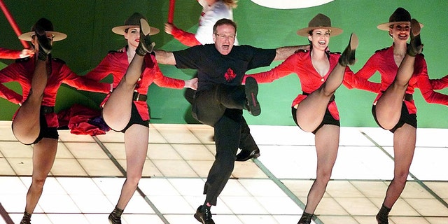 Robin Williams performs the song "Blame Canada", a song nominated for Best Original Song, during the 72nd Academy Awards 26 March 2000 at the Shrine Auditorium in Los Angeles.