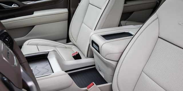 The power center console slides rearward to open up a deck between the seats.