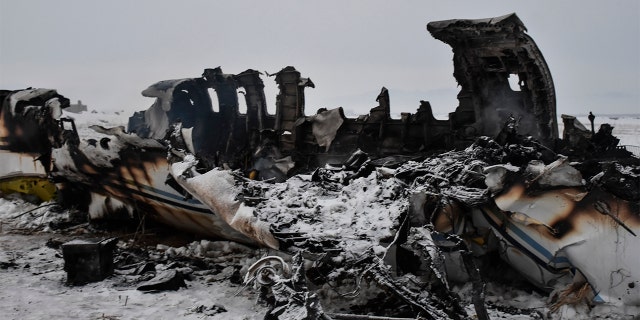 A wreckage of a U.S. military aircraft that crashed in Ghazni province, Afghanistan, is seen Monday. (AP PhotolSaifullah Maftoon)