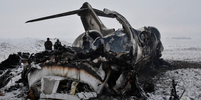 A wreckage of a U.S. military aircraft that crashed in Ghazni province, Afghanistan, is seen Monday. (AP PhotolSaifullah Maftoon)