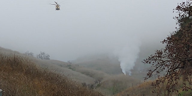 A helicopter crashed and sparked a small brush fire Sunday in Southern California, officials said.