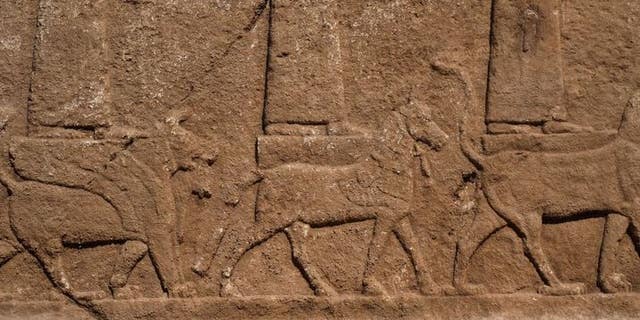 Each of the Assyrian gods and goddesses are seen standing or seated on a mythical creature.