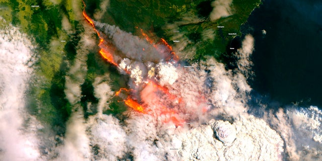 In this satellite image released by Copernicus Sentinel imagery, 2020 twitter page dated Dec. 31, 2019, shows wildfires burning across Australia.