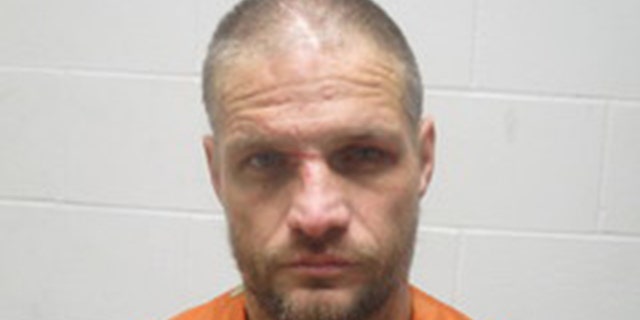 Brandon Kirby, 40, was arrested in Oklahoma on Wednesday after police say he carjacked a truck form an adult store in Missouri with a man and goat inside.